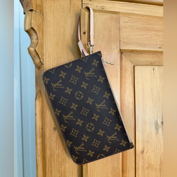 Louis Vuitton Handbags - Louis Vuitton Neverfull Monogram Brown Wristlet Like New
